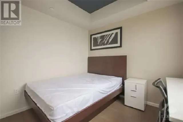 A furnished bedroom in Envie condo available Sept 1