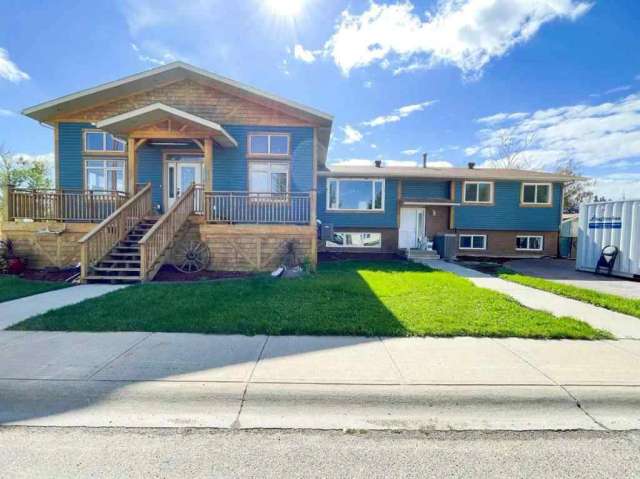 Duplex For Sale in Village of Hay Lakes, Alberta