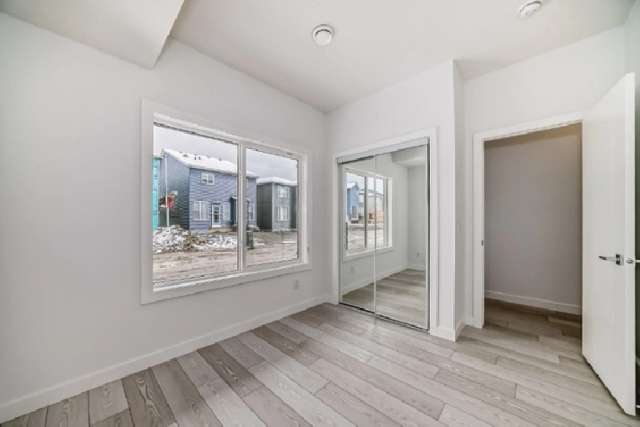 NEW END UNIT TOWNHOME IN PINECREEK SW, CALGARY
